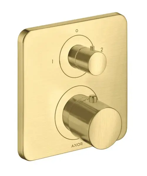 Thermostat von AXOR in gebürstetem Messing, bestehend aus zwei runden Reglern zur Temperatur- und Wasserumstellung, montiert auf quadratischem Plattenhintergrund.